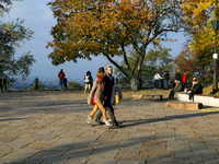 People are on the observation deck on Starokyivska (Old Kyiv) Hill in Kyiv, Ukraine, on October 28, 2024. NO USE RUSSIA. NO USE BELARUS. (