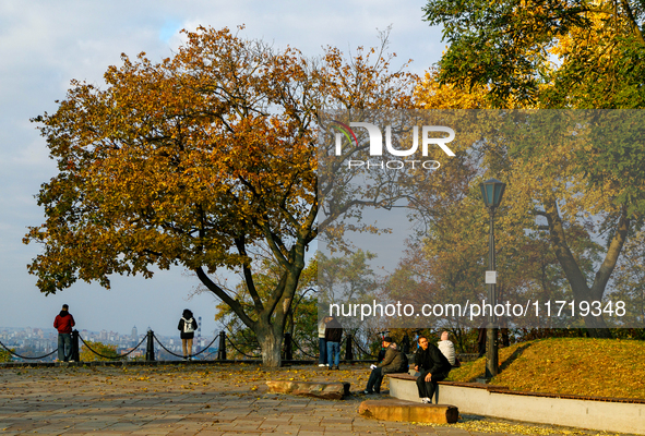 People are on the observation deck on Starokyivska (Old Kyiv) Hill in Kyiv, Ukraine, on October 28, 2024. NO USE RUSSIA. NO USE BELARUS. 