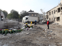 Flowers lie in memory of those killed by the Russian missile attack in the Novokodatskyi district in the evening on Friday, October 25, in D...