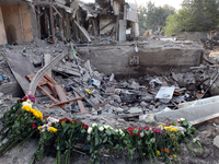 Flowers lie in memory of those killed by the Russian missile attack in the Novokodatskyi district in the evening on Friday, October 25, in D...