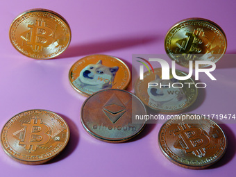 A physical commemorative coin of Bitcoin, Dogecoin, and Ethereum is displayed in Yichang, Hubei province, China, on October 29, 2024. (