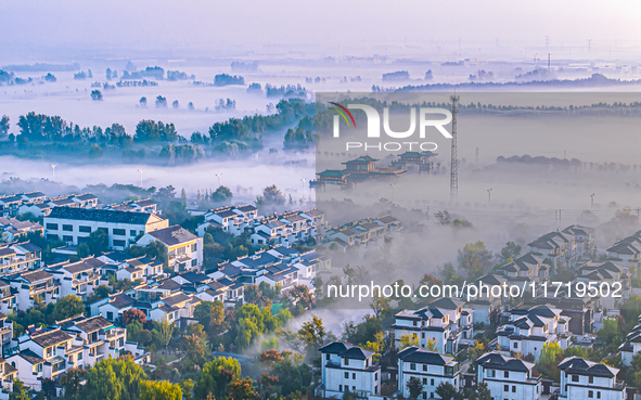 The landscape of advection fog appears in Wafang Village on the banks of the ancient Bian River in Suqian, China, on October 29, 2024. 