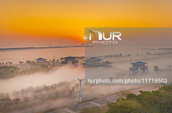 The landscape of advection fog appears in Wafang Village on the banks of the ancient Bian River in Suqian, China, on October 29, 2024. 