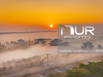 The landscape of advection fog appears in Wafang Village on the banks of the ancient Bian River in Suqian, China, on October 29, 2024. (