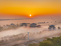 The landscape of advection fog appears in Wafang Village on the banks of the ancient Bian River in Suqian, China, on October 29, 2024. (