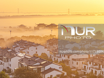 The landscape of advection fog appears in Wafang Village on the banks of the ancient Bian River in Suqian, China, on October 29, 2024. (