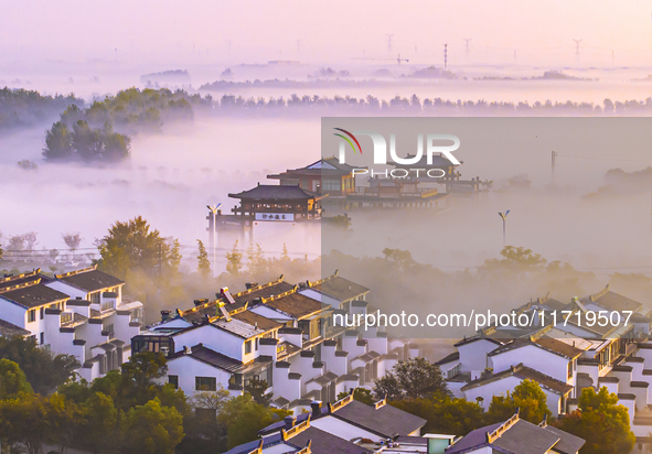 The landscape of advection fog appears in Wafang Village on the banks of the ancient Bian River in Suqian, China, on October 29, 2024. 