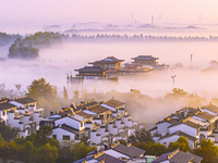 The landscape of advection fog appears in Wafang Village on the banks of the ancient Bian River in Suqian, China, on October 29, 2024. (