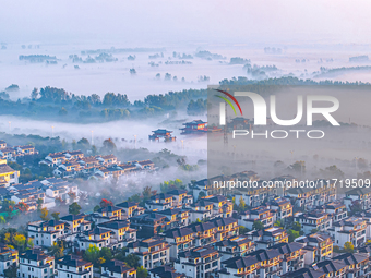 The landscape of advection fog appears in Wafang Village on the banks of the ancient Bian River in Suqian, China, on October 29, 2024. (