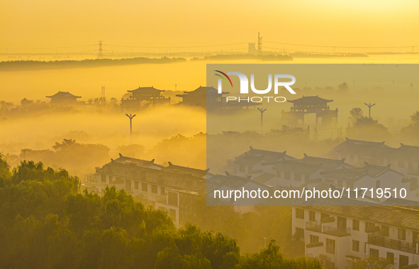 The landscape of advection fog appears in Wafang Village on the banks of the ancient Bian River in Suqian, China, on October 29, 2024. 