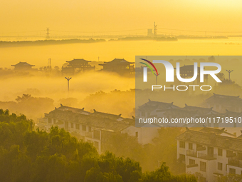 The landscape of advection fog appears in Wafang Village on the banks of the ancient Bian River in Suqian, China, on October 29, 2024. (