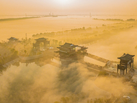 The landscape of advection fog appears in Wafang Village on the banks of the ancient Bian River in Suqian, China, on October 29, 2024. (