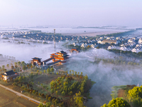 The landscape of advection fog appears in Wafang Village on the banks of the ancient Bian River in Suqian, China, on October 29, 2024. (