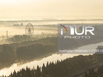 The landscape of advection fog appears in Wafang Village on the banks of the ancient Bian River in Suqian, China, on October 29, 2024. (