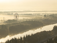 The landscape of advection fog appears in Wafang Village on the banks of the ancient Bian River in Suqian, China, on October 29, 2024. (