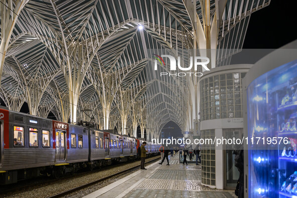 People gather on one of the platforms at Oriente railway station in Lisbon, Portugal, on October 28, 2024. Due to a growing shortfall in ben...