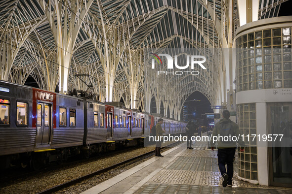 People gather on one of the platforms at Oriente railway station in Lisbon, Portugal, on October 28, 2024. Due to a growing shortfall in ben...