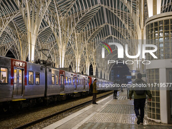 People gather on one of the platforms at Oriente railway station in Lisbon, Portugal, on October 28, 2024. Due to a growing shortfall in ben...