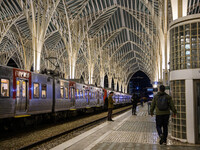 People gather on one of the platforms at Oriente railway station in Lisbon, Portugal, on October 28, 2024. Due to a growing shortfall in ben...