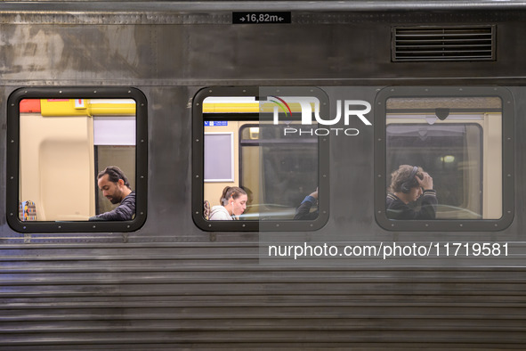 Several passengers are seen inside a train carriage at Oriente railway station in Lisbon, Portugal, on October 28, 2024. Due to a growing sh...