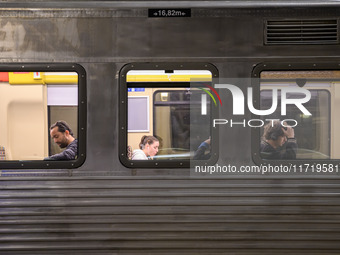 Several passengers are seen inside a train carriage at Oriente railway station in Lisbon, Portugal, on October 28, 2024. Due to a growing sh...