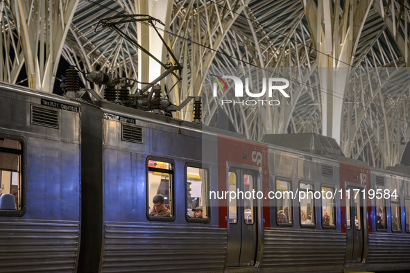 Several passengers are inside a train carriage at Oriente railway station in Lisbon, Portugal, on October 28, 2024. Due to a growing shortfa...