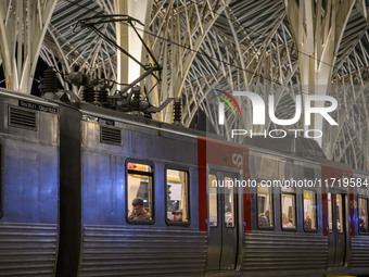 Several passengers are inside a train carriage at Oriente railway station in Lisbon, Portugal, on October 28, 2024. Due to a growing shortfa...