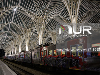 A train is parked on one of the transit lines at Oriente railway station in Lisbon, Portugal, on October 28, 2024. Due to a growing shortfal...