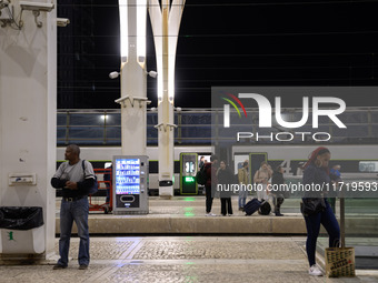 People gather on one of the platforms at Oriente railway station in Lisbon, Portugal, on October 28, 2024. Due to a growing shortfall in ben...