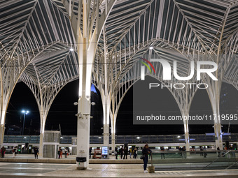 People gather on one of the platforms at Oriente train station in Lisbon, Portugal, on October 28, 2024. Due to a growing shortfall in benef...