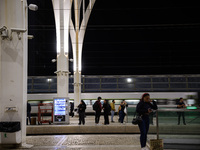 People gather on one of the platforms at Oriente train station in Lisbon, Portugal, on October 28, 2024. Due to a growing shortfall in benef...