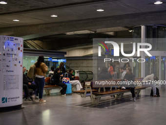 Several people wait for a train in one of the halls of Oriente railway station in Lisbon, Portugal, on October 28, 2024. Due to a growing sh...