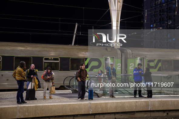 People gather on one of the platforms at Oriente train station in Lisbon, Portugal, on October 28, 2024. Due to a growing shortfall in benef...