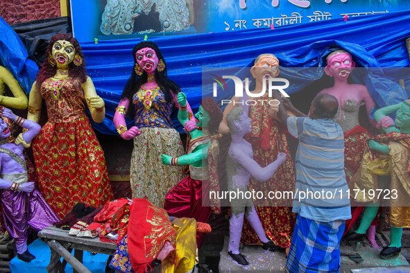 An artist makes figurines of demons ahead of Bhoot Chaturdashi, or Indian Halloween, in Kolkata, India, on October 29, 2024. 