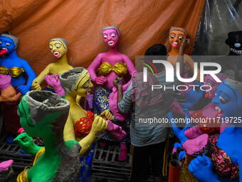 An artist makes figurines of demons ahead of Bhoot Chaturdashi, or Indian Halloween, in Kolkata, India, on October 29, 2024. (