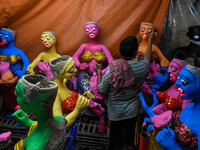 An artist makes figurines of demons ahead of Bhoot Chaturdashi, or Indian Halloween, in Kolkata, India, on October 29, 2024. (