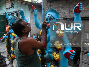 Artists make idols of Goddess Kali ahead of the Kali Puja and Diwali festival in Kolkata, India, on October 29, 2024. (