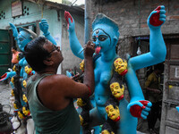 Artists make idols of Goddess Kali ahead of the Kali Puja and Diwali festival in Kolkata, India, on October 29, 2024. (