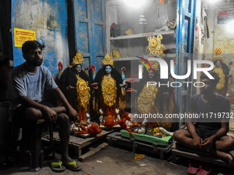 Artists sell idols of Goddess Kali ahead of the Kali Puja and Diwali festival in Kolkata, India, on October 29, 2024. (