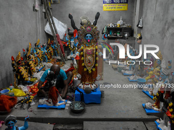 Artists make idols of Goddess Kali ahead of the Kali Puja and Diwali festival in Kolkata, India, on October 29, 2024. (