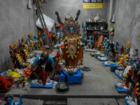 Artists make idols of Goddess Kali ahead of the Kali Puja and Diwali festival in Kolkata, India, on October 29, 2024. (