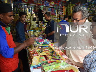 People buy firecrackers at a firecracker fair ahead of the Diwali and Kali Puja festival in Kolkata, India, on October 29, 2024. (