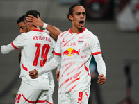 Yussuf Poulsen of Leipzig celebrates the teams first goal during the DFB Cup  Second Round match between RB Leipzig and FC St. Pauli at Red...