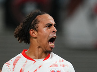 Yussuf Poulsen of Leipzig celebrates the teams first goal during the DFB Cup  Second Round match between RB Leipzig and FC St. Pauli at Red...