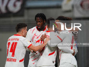 Yussuf Poulsen of Leipzig celebrates the teams first goal during the DFB Cup  Second Round match between RB Leipzig and FC St. Pauli at Red...