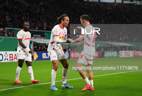 Yussuf Poulsen of Leipzig celebrates the teams third goal during the DFB Cup  Second Round match between RB Leipzig and FC St. Pauli at Red...