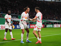 Yussuf Poulsen of Leipzig celebrates the teams third goal during the DFB Cup  Second Round match between RB Leipzig and FC St. Pauli at Red...