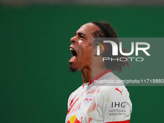 Yussuf Poulsen of Leipzig celebrates the teams third goal during the DFB Cup  Second Round match between RB Leipzig and FC St. Pauli at Red...