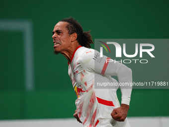 Yussuf Poulsen of Leipzig celebrates the teams third goal during the DFB Cup  Second Round match between RB Leipzig and FC St. Pauli at Red...