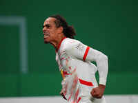 Yussuf Poulsen of Leipzig celebrates the teams third goal during the DFB Cup  Second Round match between RB Leipzig and FC St. Pauli at Red...